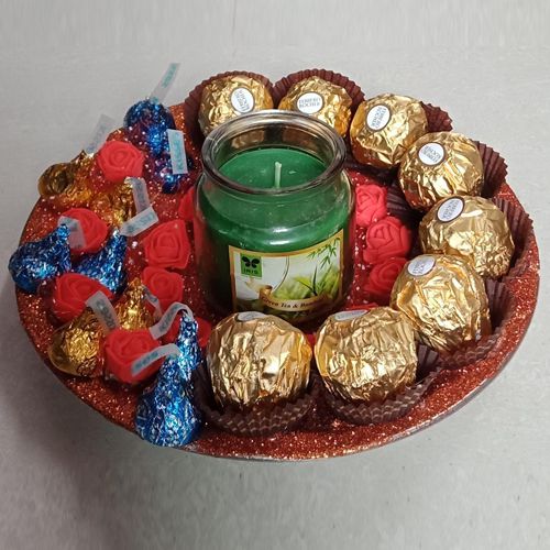 Tasty Assorted Chocolates Aroma Candles N Decorative Flowers Gift Tray