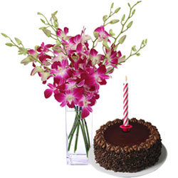 Yummy Chocolate Cake and Orchids in Vase with Candles