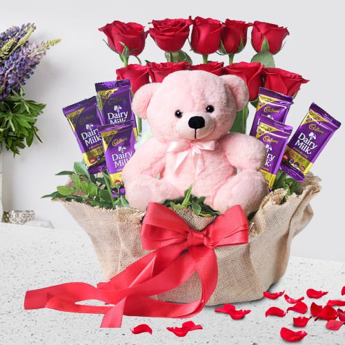 Splendid Basket of Red Roses with Cadbury Dairy Milk N Cute Teddy
